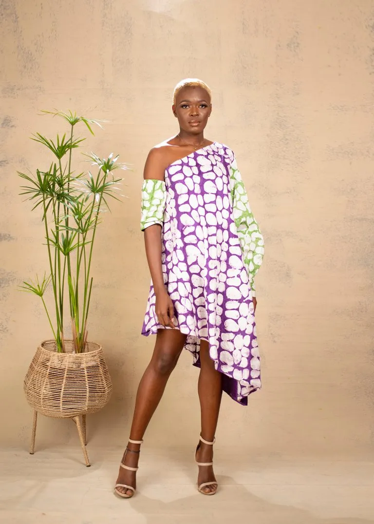 Aimas Onwe admire Asymmetric style dress