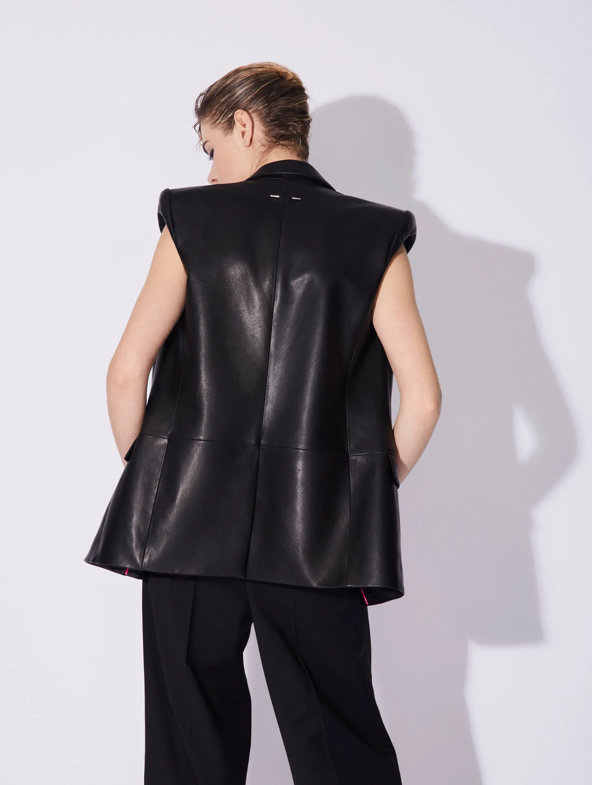 Black plongé lambskin leather sleeveless jacket