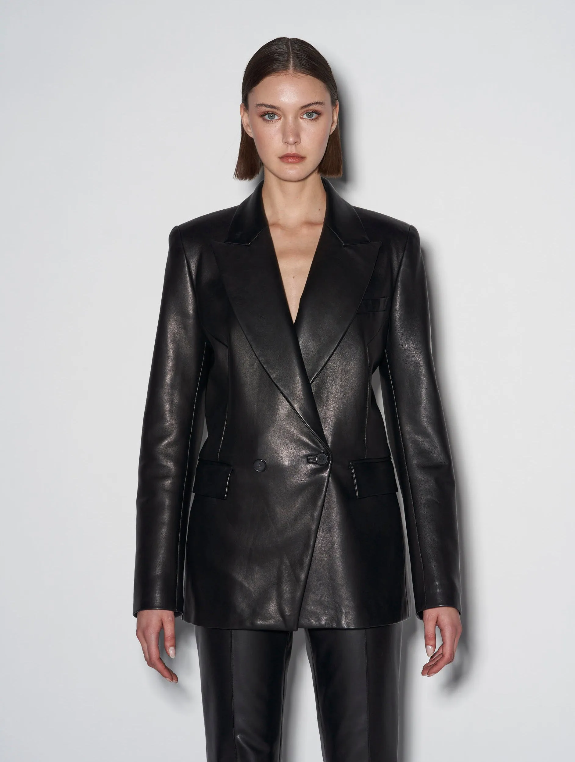 Long black plongé leather suit jacket