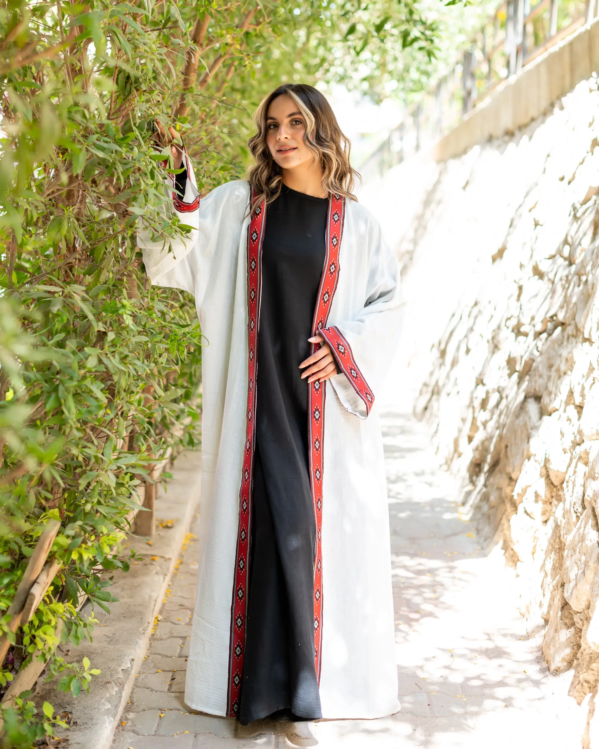 White cloak with Red Indian tape