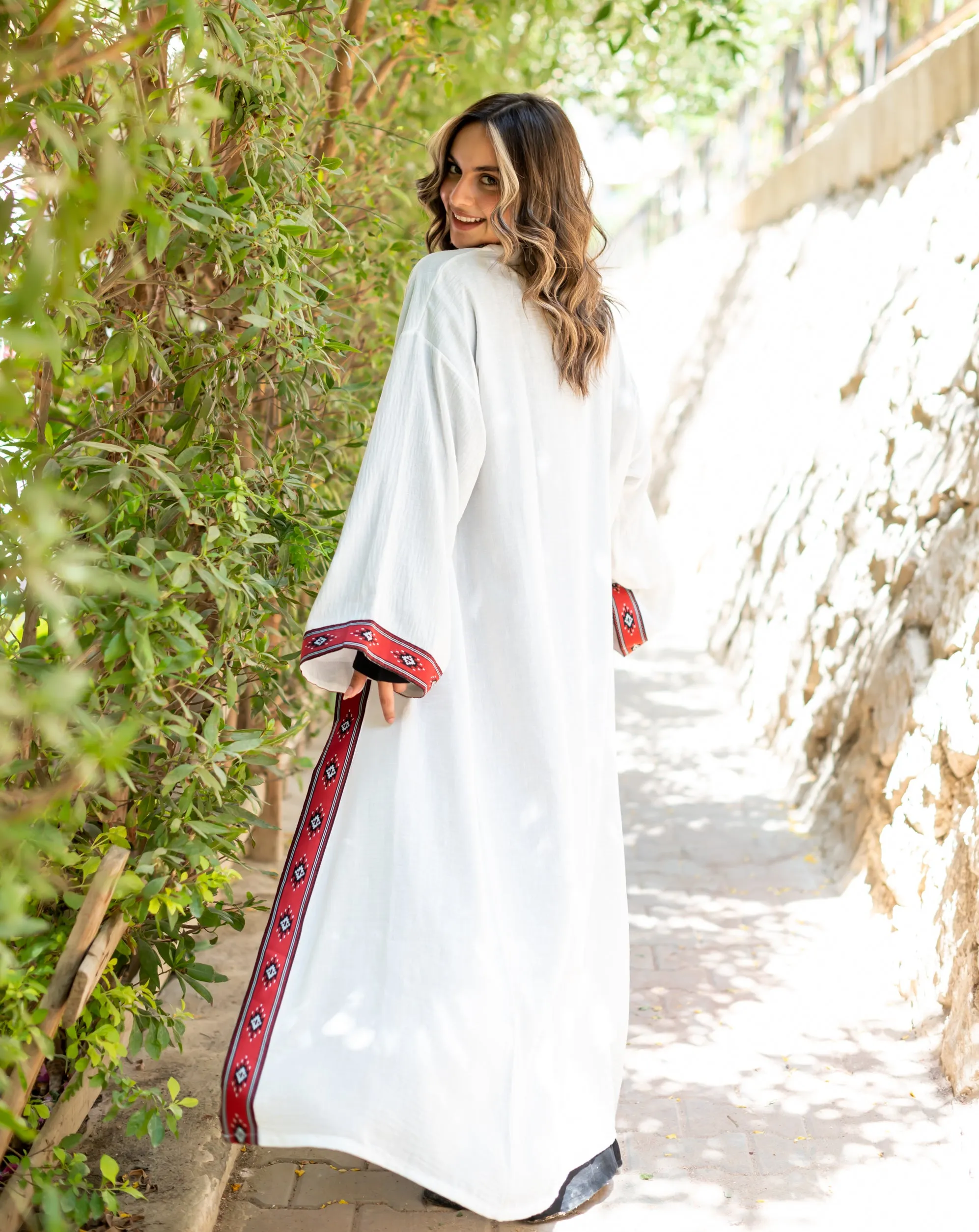 White cloak with Red Indian tape